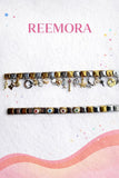 Reemora Signature Dual-Tone Charm Bracelet Collection