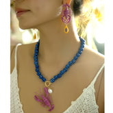 Blue Beaded Necklace with Purple Scorpion Pendant