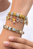Timeless Dual-Tone Charm Bracelet with Signature Evil Eye Detail