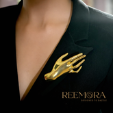 Golden Hand Statement Brooch