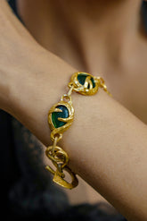 Elegant Gold Link Bracelet with Green Gem Accents Bracelet
