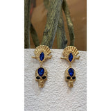 Gold Skull Drop Earrings with Blue Stone