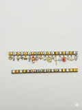 Timeless Dual-Tone Charm Bracelet with Signature Evil Eye Detail
