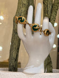 Elegant Gold Link Bracelet with Green Gem Accents Bracelet