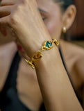 Elegant Gold Link Bracelet with Green Gem Accents Bracelet