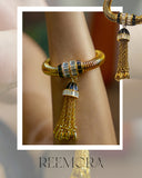 Golden Coil Bracelet with Black Tassel Charm Bracelet